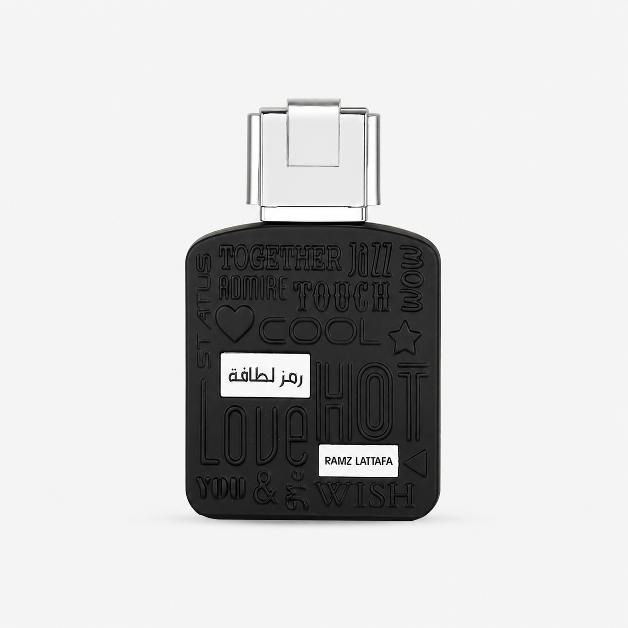 A black rectangular perfume bottle with a silver cap, featuring embossed Arabic and English words including 'LOVE', 'HOT', 'TOUCH', and 'WISH', with two small white labels on the front.