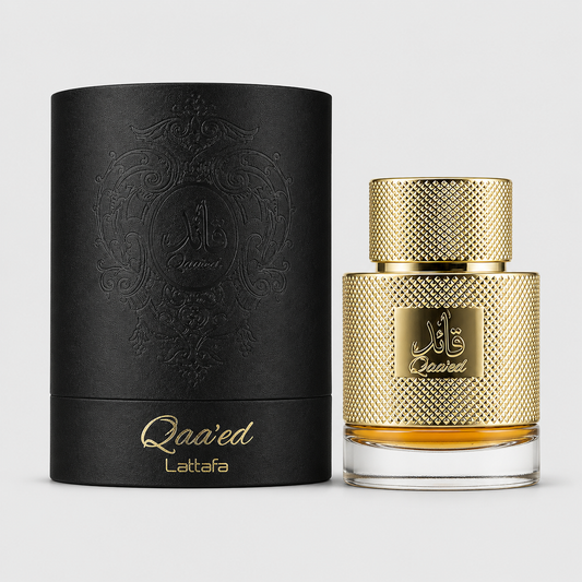 Qa'ed Lattafa perfume bottle with a textured gold cap and gold-embossed body next to its black cylindrical box with gold lettering, on a light gray background.